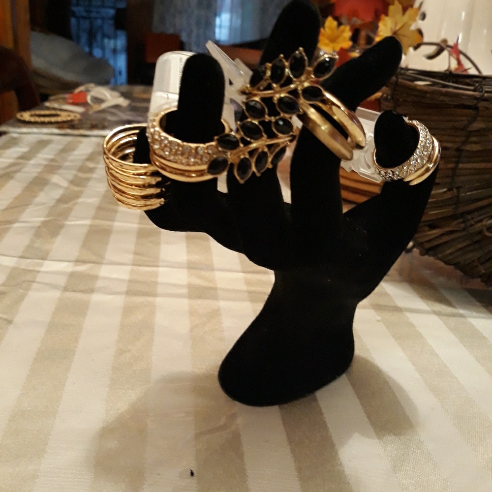Bundle of gold colored rings